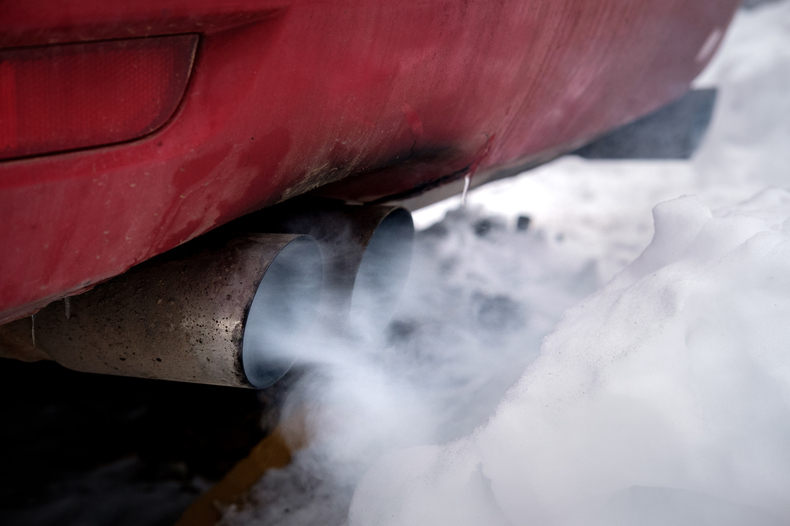 smoking red car exhaust