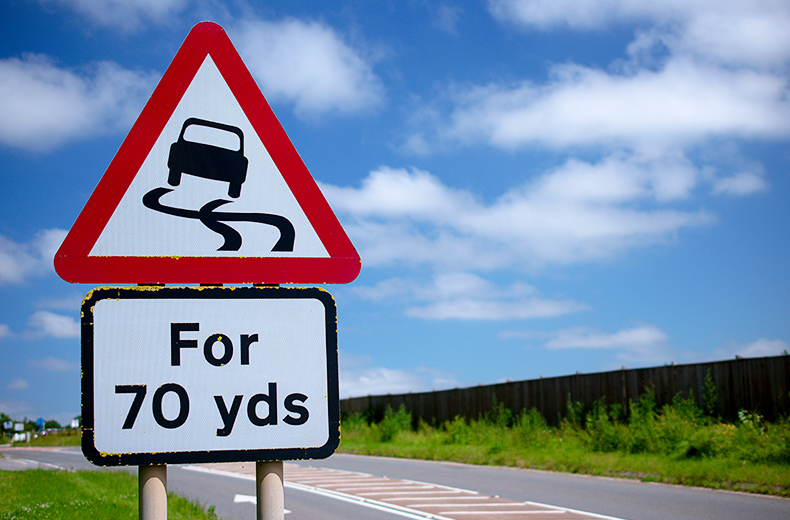 highway-code-slippery-road-sign