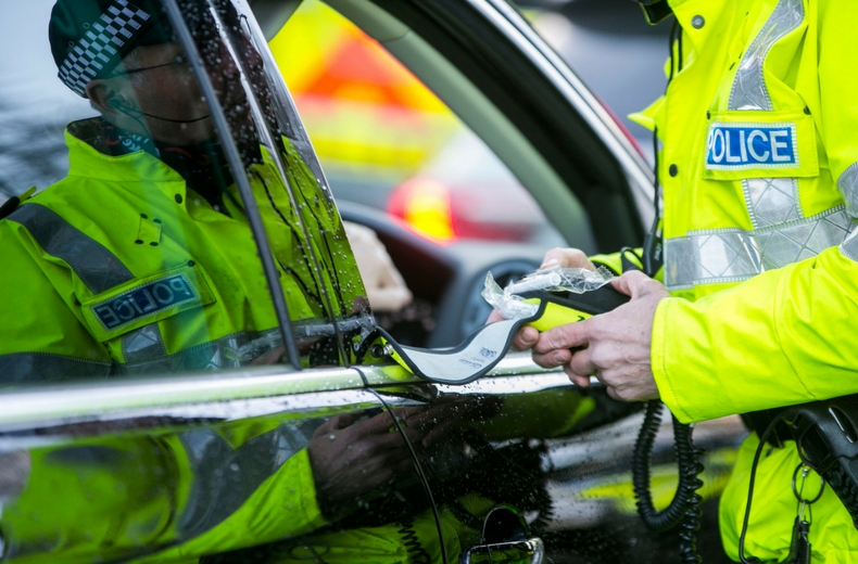 police officer speaking to driver